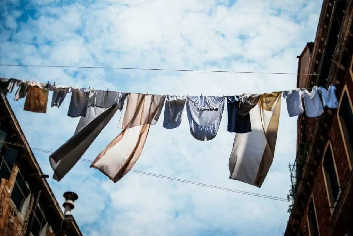 Laundry hanging on clothesline across balcony